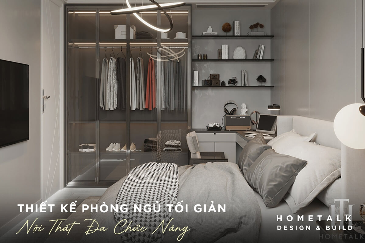 He tu quan ao lon voi canh cua kinh mo mau xam dam ket hop voi goc lam viec voi ban lam viec mau trang va cac ngan keo tich hop trong phong ngu toi gian tai chung cu quan 11