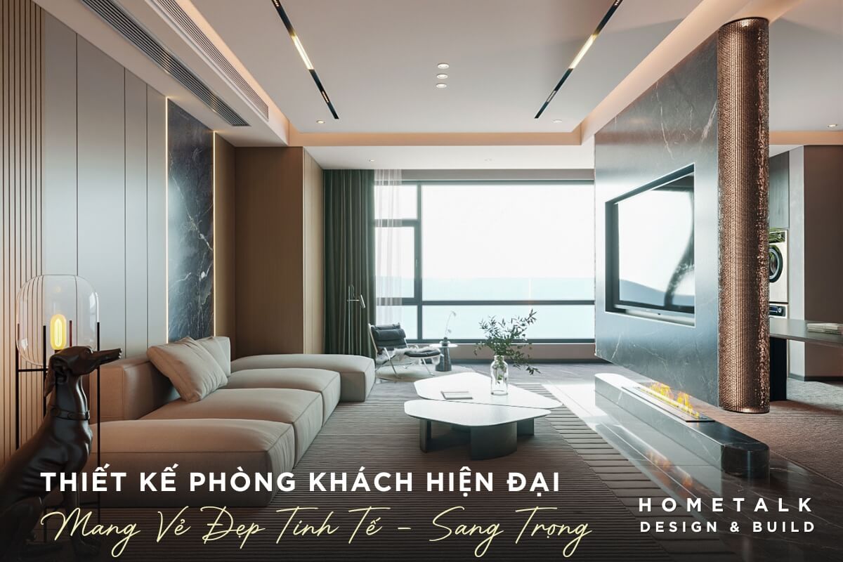 Phong khach voi sofa lon mau be nhat voi thiet ke hien dai, thoai mai, co nhieu goi tua cung tong mau, tao su em ai va sang trong