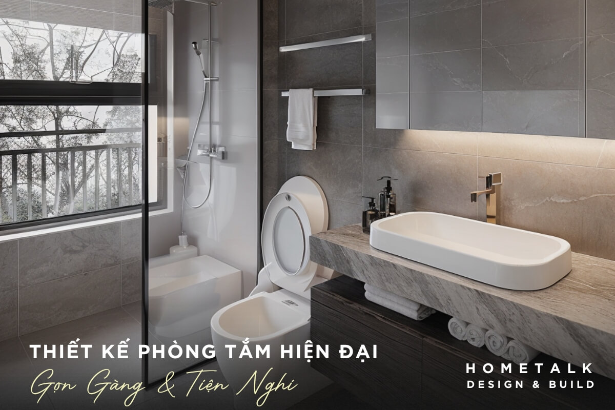 Phong tam duoc thiet ke voi tong mau xam chu dao, ket hop voi cac vat lieu cao cap nhu da van va kinh